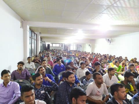 A group of members celebrating a society milestone.